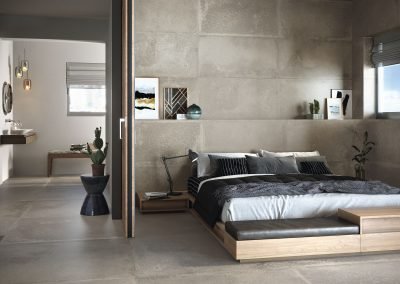 stone concrete effect wall and floor tiles used in a bedroom from design di lusso watford