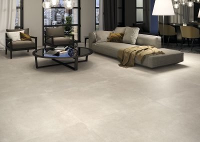 stone concrete effect tiles from design di lusso watford used on living room floor