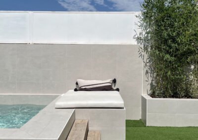 light grey rectangle floor and wall tiles used on pool side area from design di lusso watford outdoor tile store